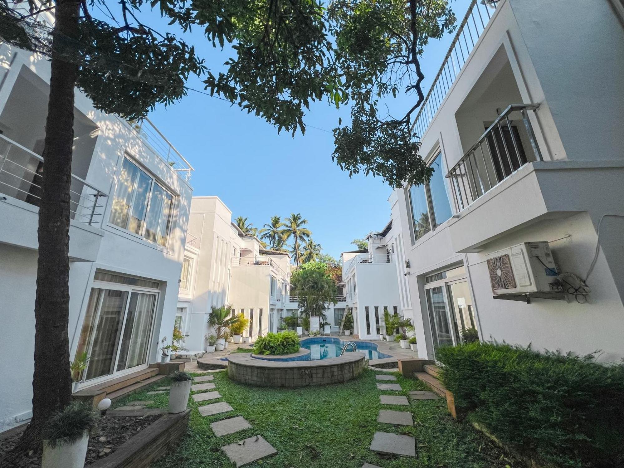 Villa M - Jia 3: Poolside Retreat in Candolim Exterior photo